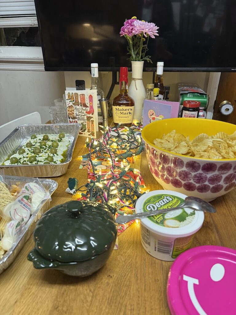 My kitchen coutner filled with birthday snacks and an old fashioned bar